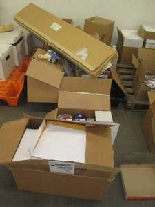 lot 194 image: Pallet of envelopes, promotional items and a shipping paper dispenser