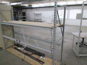 lot 105 image: Tear Drop shelving unit with electronic cords