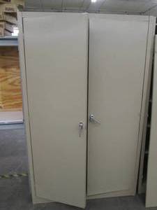 lot 107 image: Bi Fold door metal cabinet with shelves