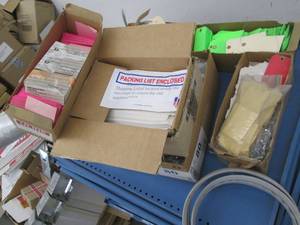 lot 142 image: Pallet of tags and shipping supplies