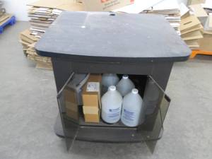 lot 146 image: Cart on wheels with assorted commercial supplies