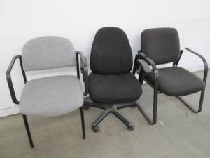 lot 201 image: 2 Reception chairs and a rolling de...