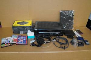 lot 195 image: Assorted Electronics - Digital Cameras, Charge Cords, Head Phones