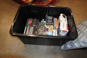 lot 266 image: Plastic Bin with Assorted DVDs and VHS Movies