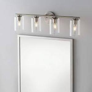 lot 29 image: Hampton Bay Champlain 31.5 in. 4-Light Brushed Nickel Modern Bathroom Vanity Light with Clear Glass Shades Customer Returns See Pictures