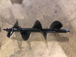 lot 37 image: RYOBI 10 in. Earth Auger Bit  Customer Returns See Pictures