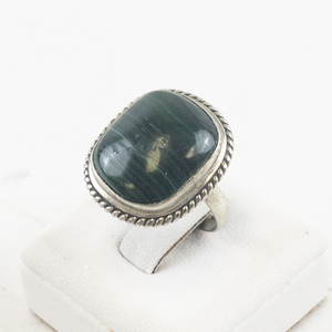 lot 49 image: Malachite Cabochon Base Metal Ring. Size 6