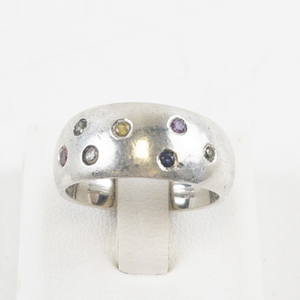 lot 67 image: Sterling Silver Domed Ring with Multi-Colored CZ Stones. Size 7.5-8
