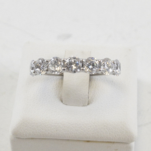 lot 69 image: ArtCarved Ladies Sterling Silver7-Stone CZ Band. Size 7