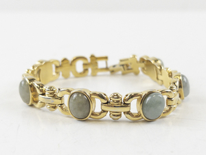 lot 124 image: Gold-Tone Bracelet with Green Stone Accents