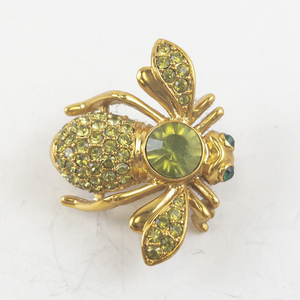 lot 150 image: Joan Rivers Gold-Tone Bee Brooch with Green Rhinestones