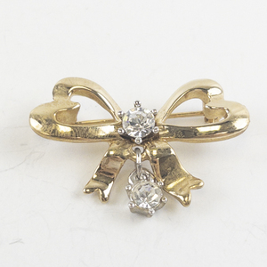 lot 169 image: Gold-Tone Bow Brooch with Clear Stones