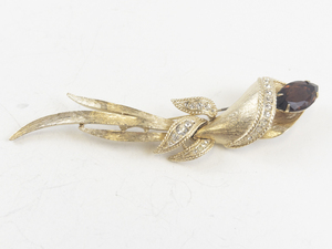 lot 172 image: Sarah Coventry Gold Tone Floral Brooch with Rhinestones and Red Stone