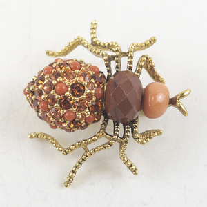 lot 179 image: Joan Rivers Gold Tone Beaded Bug Brooch Pin