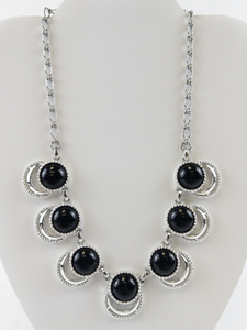 lot 216 image: Sarah Coventry Silver Tone Necklace with Black Cabochon Accents
