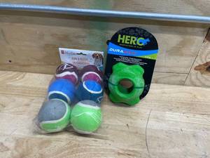lot 123 image: Lot of 2 Dog Toys - Tennis Balls 6pk and Hero Treat Dispensing Ball