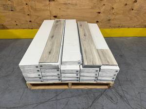 lot 22 image: Lifeproof Lot of 23 cases  Banff Gray Vinyl Plank Flooring (Total of 437 sq. ft.  loose pieces)