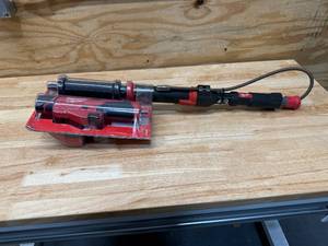 lot 54 image: Milwaukee M12 Trap Snake 12V Lithium-Ion Cordless 4 ft. Urinal Auger Drain Cleaning Kit