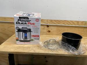 lot 130 image: Lot of 2 - Power XL Pressure Cooker 6 qt Black Quick Pot and Paula Deen 8qt Ceramic Nonstick Pressure Cooker Inner Pot & Glass Lid