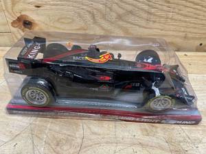 lot 164 image: Light Up Black Friction Powered Formula Race Car with Sound Jia Yue Toys