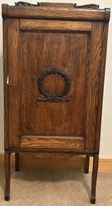 lot 9 image: Antique Oak Wood Sheet Music Cabinet with Intricate Carving