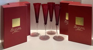 lot 42 image: Set of 12 Holiday Gems Ruby Toasting Flutes in original boxes