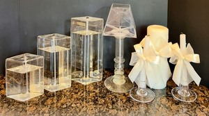 lot 114 image: 7 Piece Collection of Decorative Oil & Wax Candles with Glass Stands