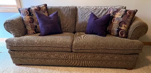 lot 5C image: Brown Fabric Sleeper Sofa with Decorative Pillows