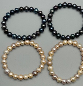 lot 39 image: Set of 4 Fresh Water Pearl Bracelets in Mixed Colors Champagne & Plum