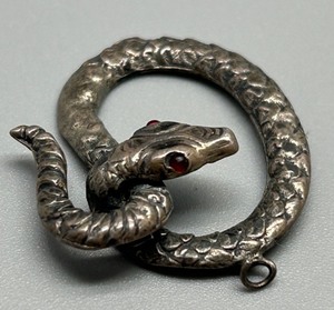 lot 85 image: Vintage Sterling Silver Snake Pendant with Red Garnet Eyes