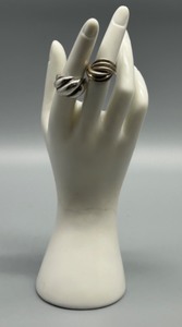 lot 106 image: Pair of Vintage Sterling Silver and Gold Twist Design Rings
