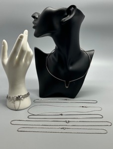 lot 117 image: Collection of 6 Sterling Silver Chains and Bracelets with Elegant Designs