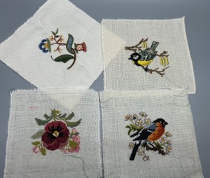 lot 157 image: Set of 4 Hand-Embroidered Vintage Textile Squares with Floral and Bird Motifs