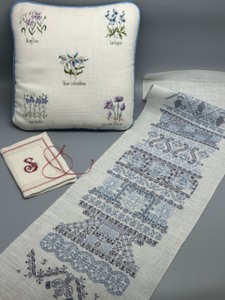 lot 158 image: Handcrafted Linen Cross Stitch Collection with Floral Pillow and Monogrammed Booklet