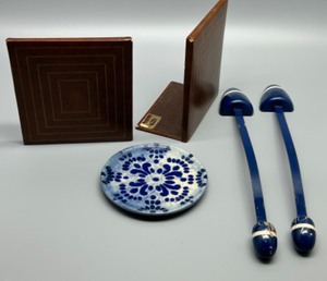 lot 315 image: Collection of Costa Nova Plate, MCM Leather Wrapped Bookends, and Shoe Stretchers
