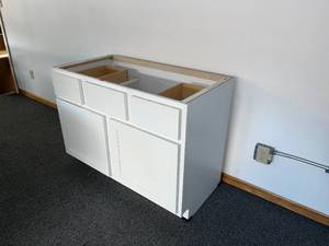 lot 29 image: White Sink Vanity Cabinet  2 Drawers & 2 Doors
