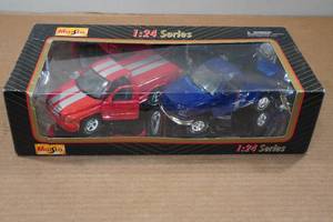 lot 28 image: Maisto 124 Scale Model Trucks