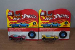 lot 35 image: 2 Hot Wheels Authentic Commemorative Replicas with Buttons