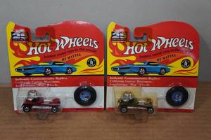 lot 40 image: 2 Hot Wheels Authentic Commemorative Replicas with Buttons