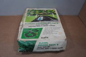 lot 104 image: Vintage Eldon Power Pack 8 Road Race Slot Car Set