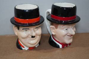 lot 118 image: 2 Ceramic Mugs - Stan Laurel & Oliver Hardy