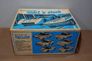 lot 152 image: Vintage Montgomery Ward Sport N Stock Road Race Set