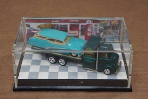 lot 201 image: Hot Wheels Elwoody Custom Car on Truck and Trailer