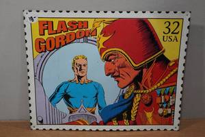 lot 228 image: Vintage Metal Flash Gordon Postage Stamp Sign