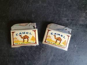 lot 22 image: 2 Vintage Camel Cigarette Lighters