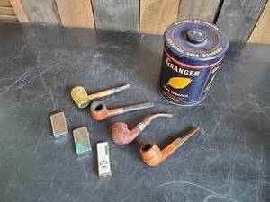 lot 80 image: Vintage Pipes, Zippo Lighters, and Tobacco Tin