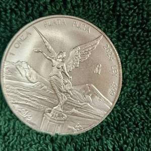 lot 20 image: 2024 1 Ounce Mexican Plata Pure Silver Round