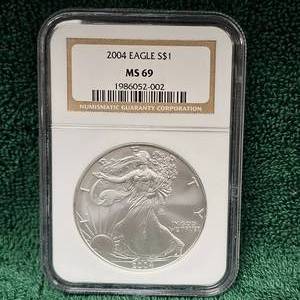 lot 21 image: 2004 Silver Eagle NGC MS-69 I ounce Silver