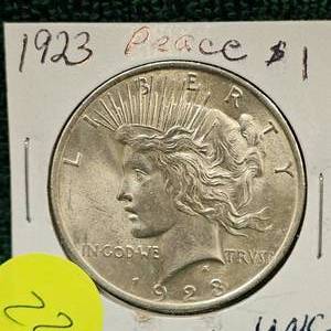 lot 22 image: 1923 Peace Dollar Uncirculated