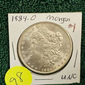 lot 98 image: 1884-O Morgan $1 UNC